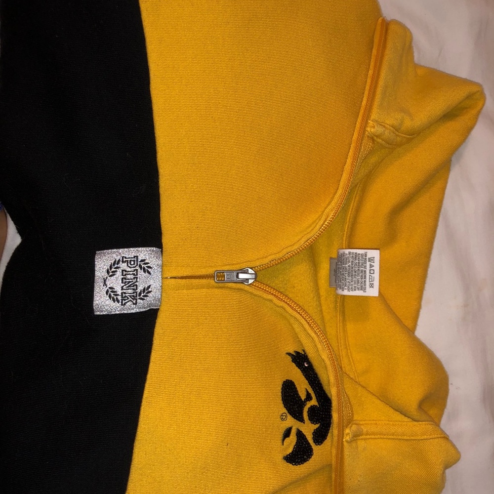 Black and yellow Hawkeye pink sweatshirt